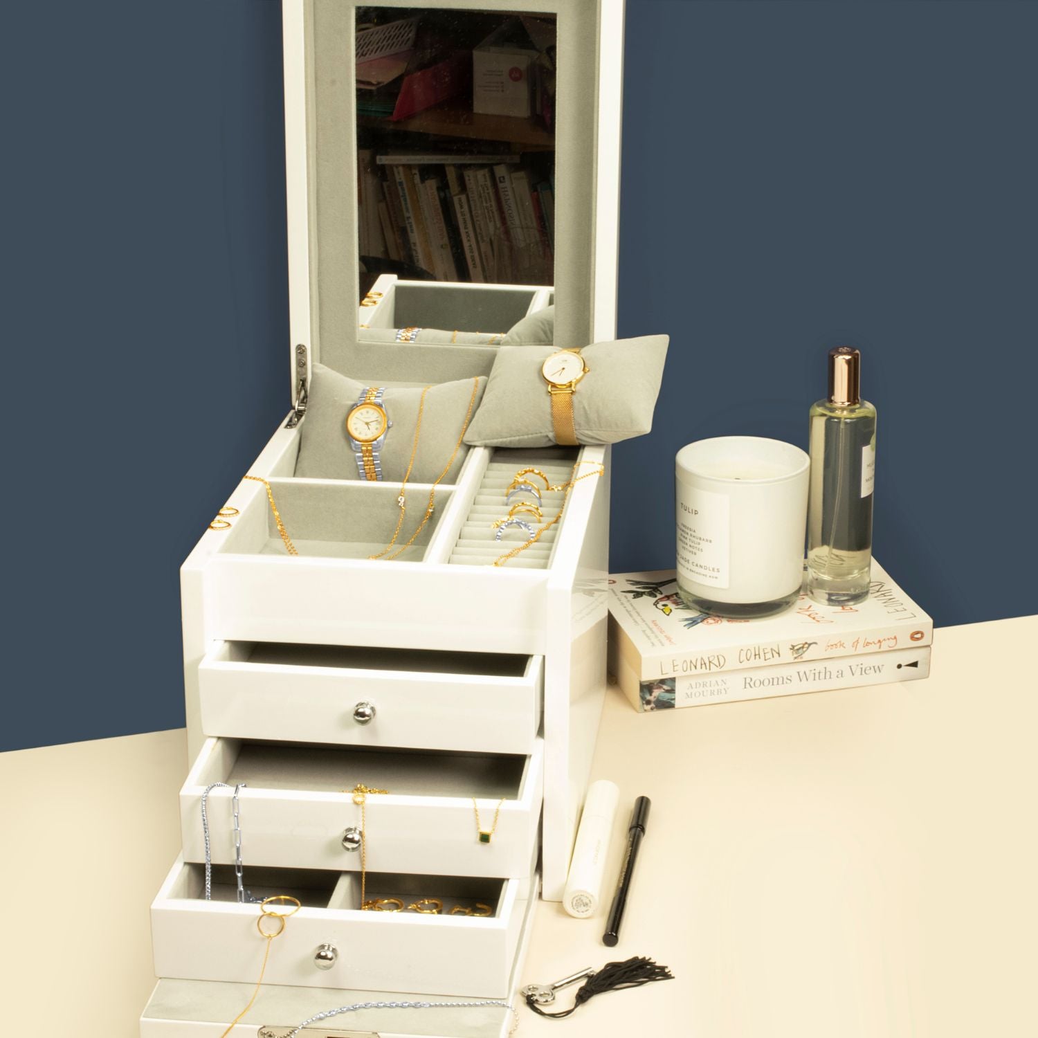 White gloss 3-drawer jewellery box open, showcasing neatly organized rings, necklaces, and accessories inside