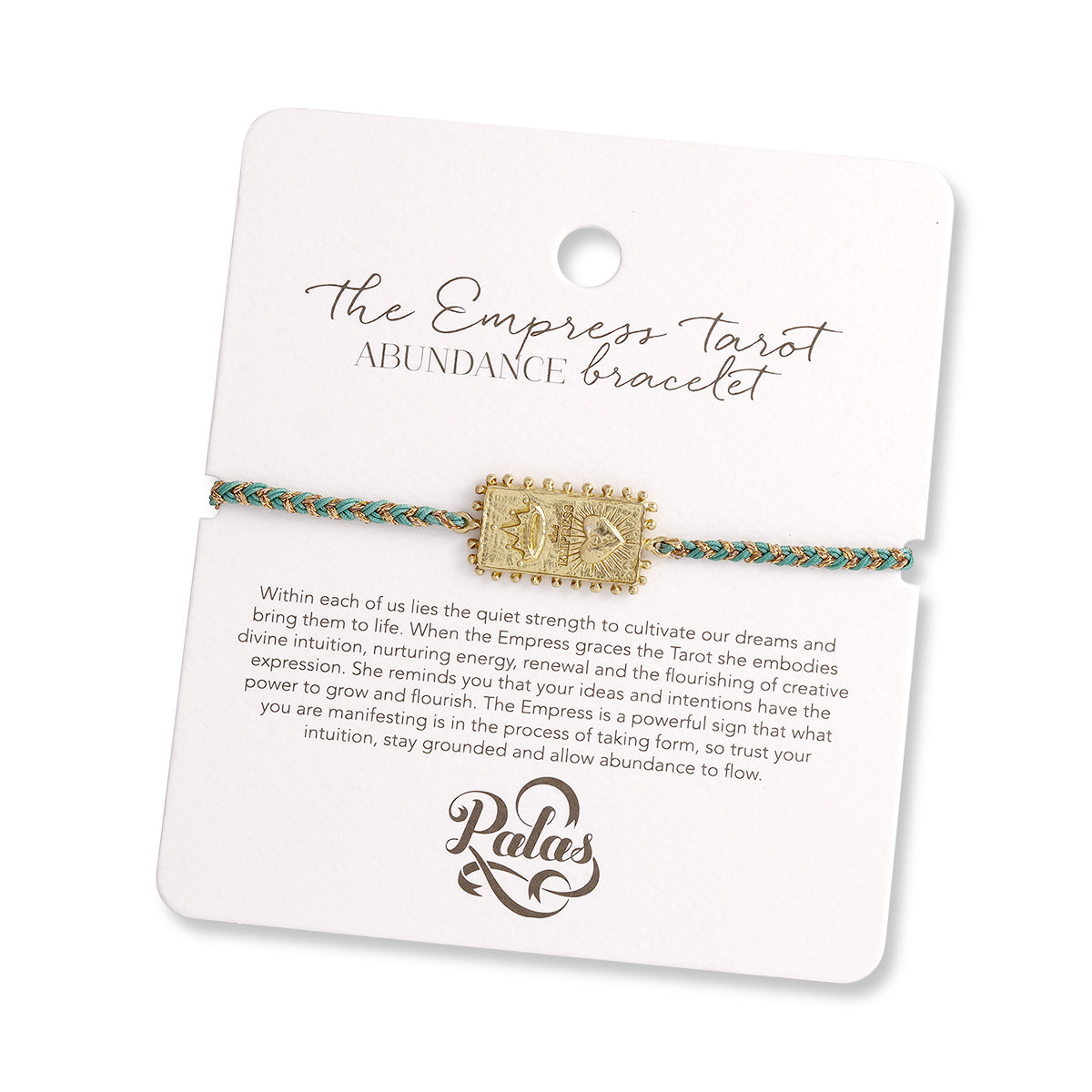 Gold bracelet with green accents on a white card with text and branding