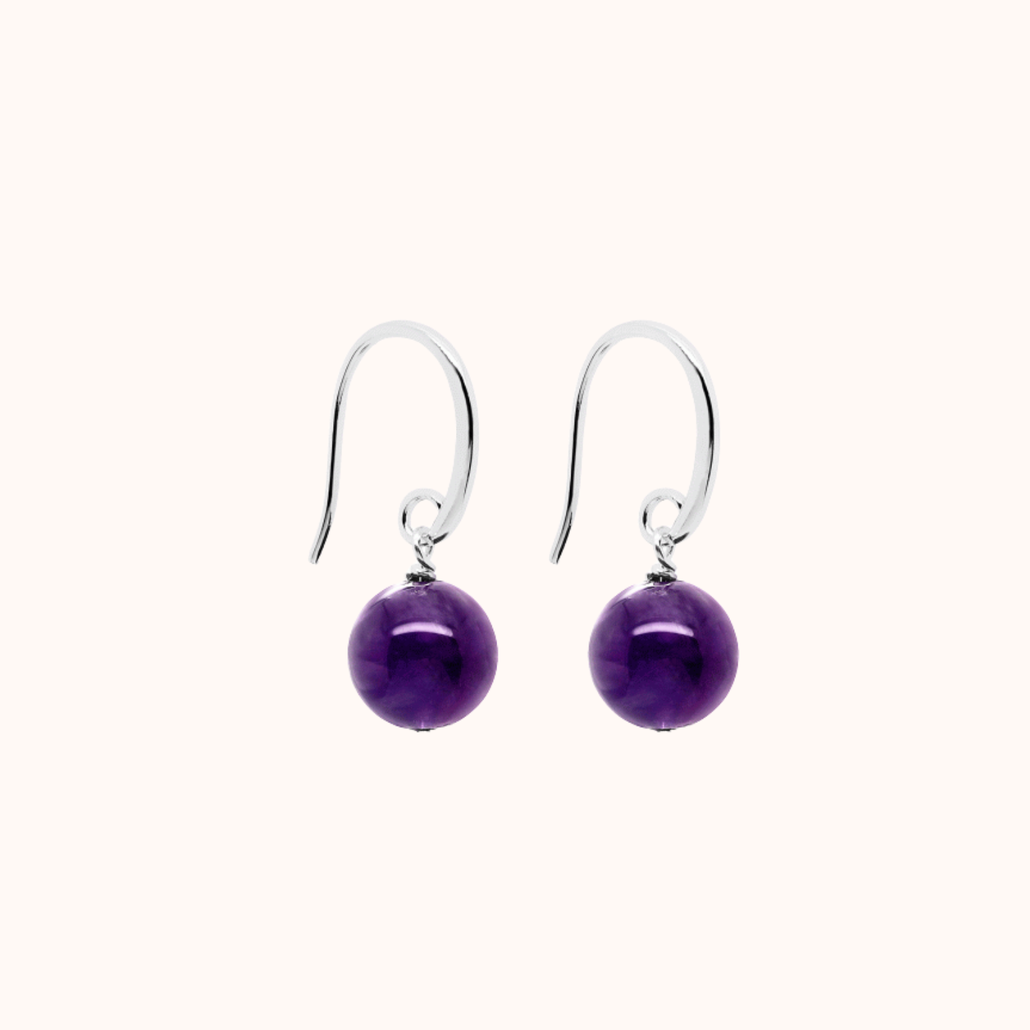 Pair of purple Amethyst earrings on a white background