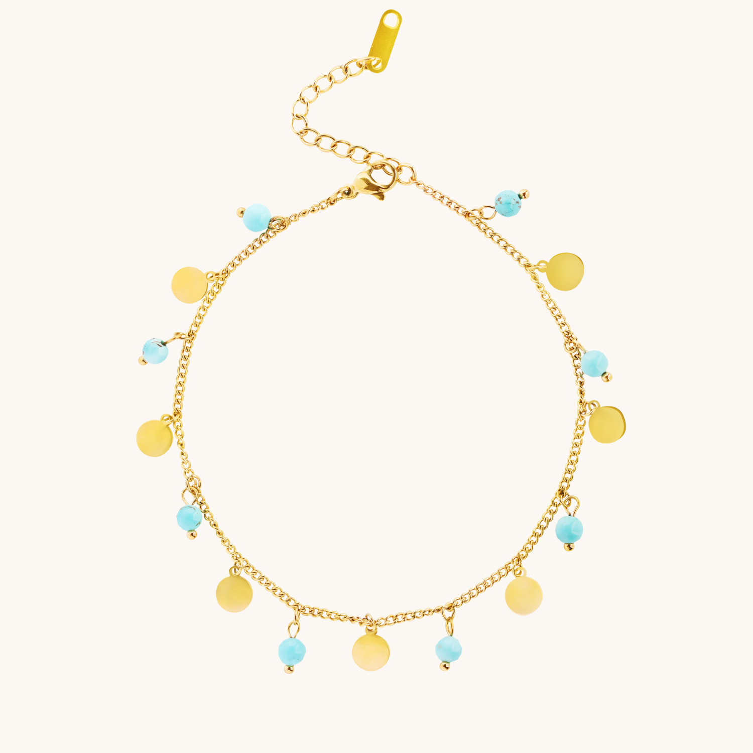 Anklet with blue beads and gold drop design