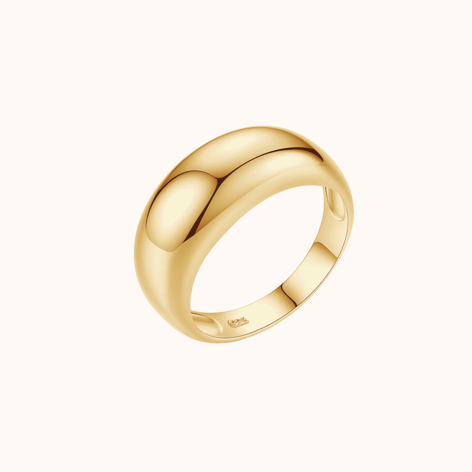 Gold Dome ring on a white background
