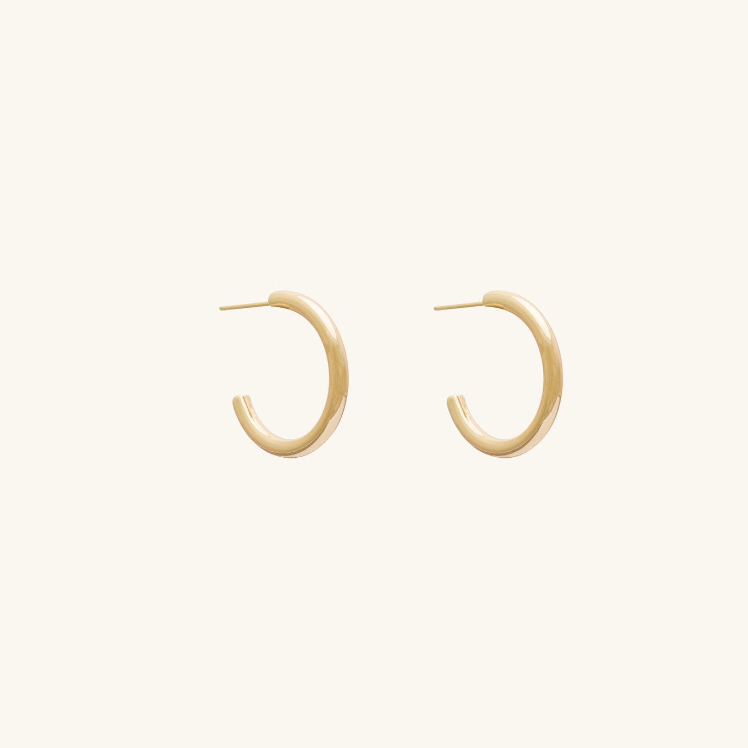 20 mm Gold hoop earrings on a white background