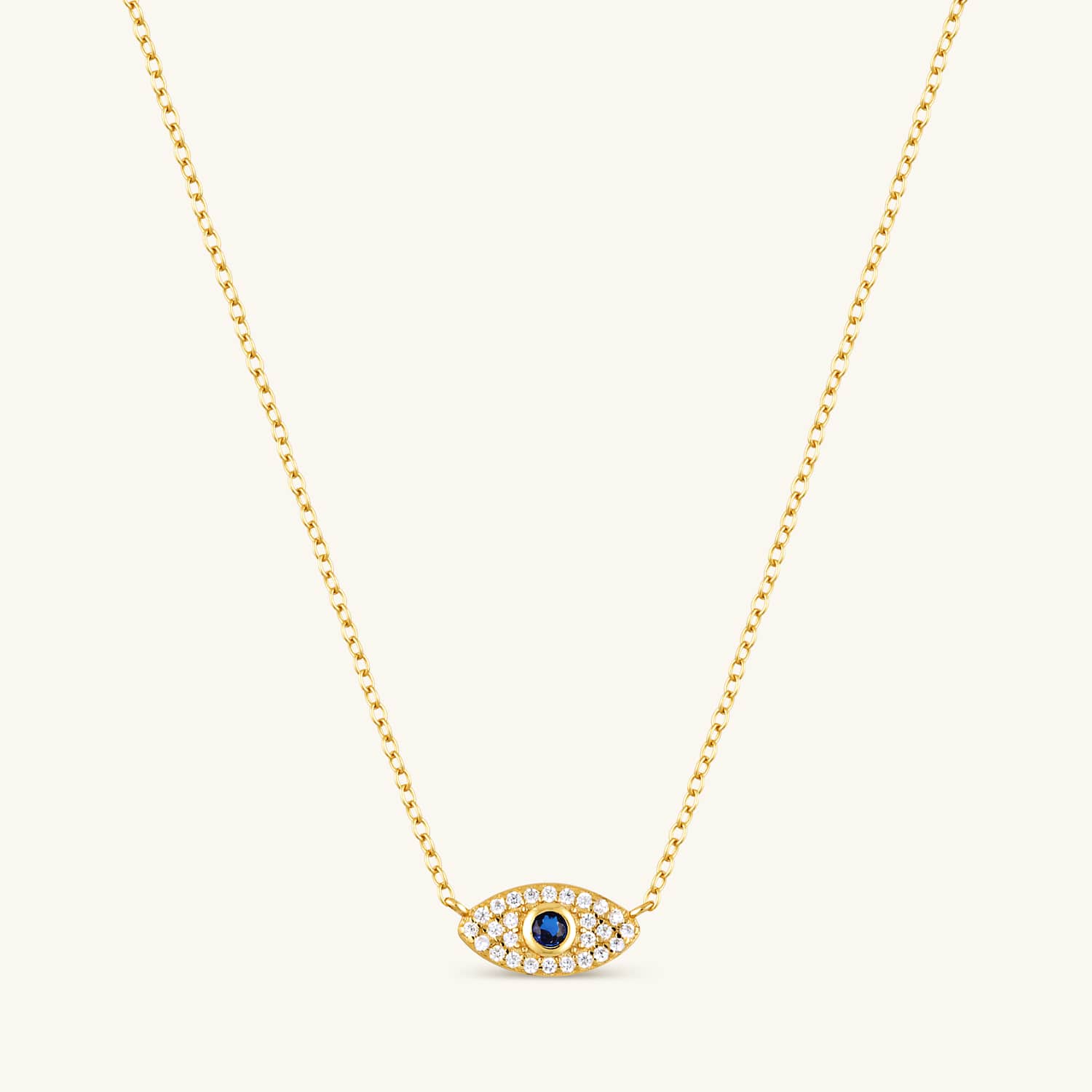 Gold evil eye necklace with a delicate chain, featuring a symbolic protective charm with a polished finish for a stylish and meaningful look
