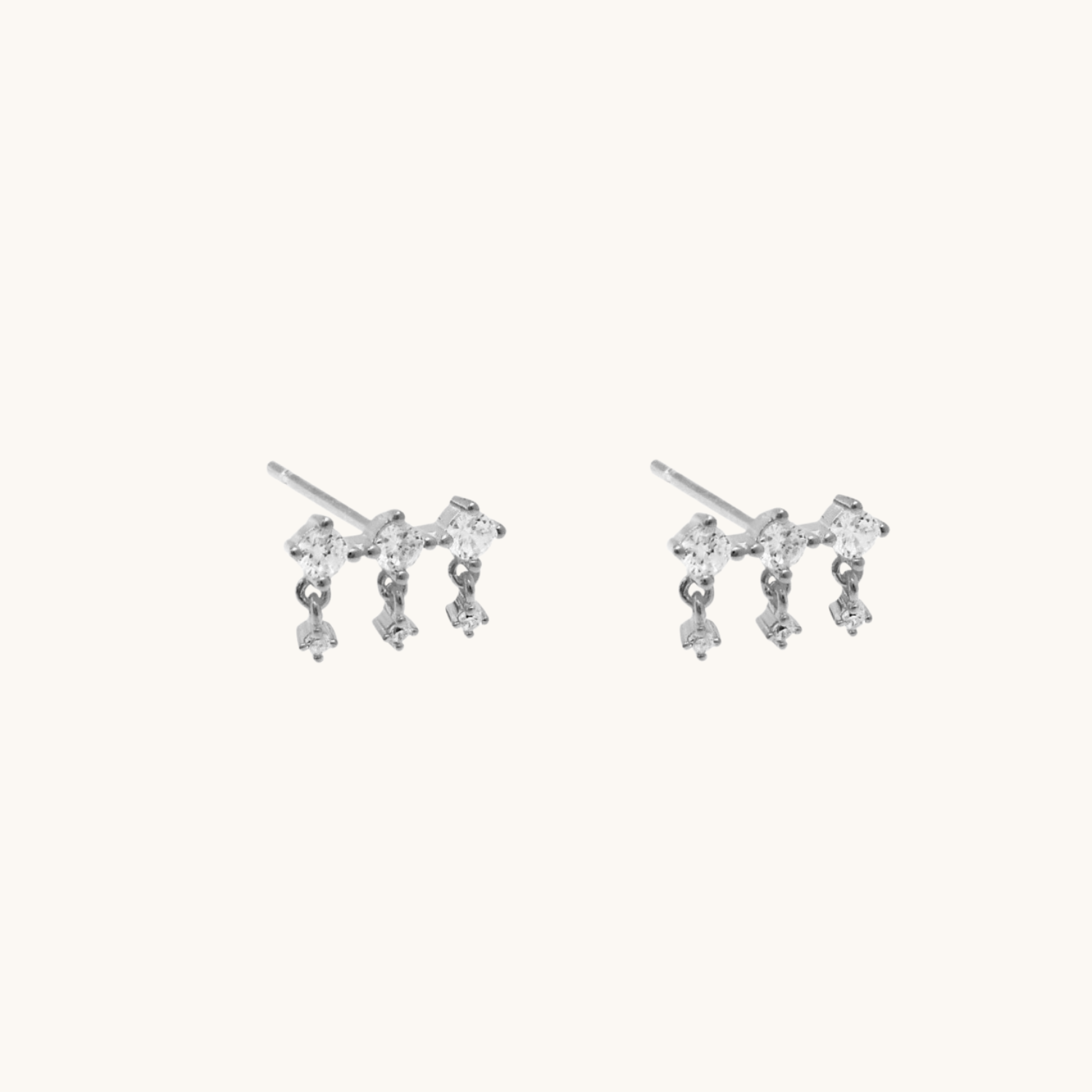 Falling Sparkle Cubic Zirconia earrings on a white background