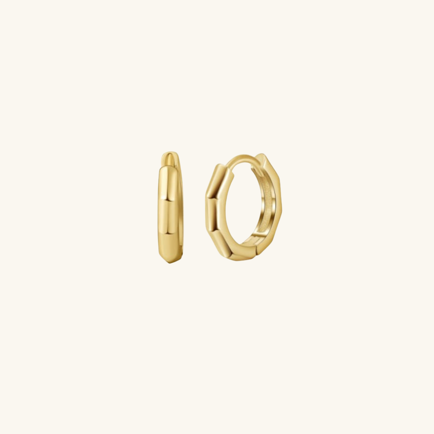 Geometric Gold plated huggies on cream background