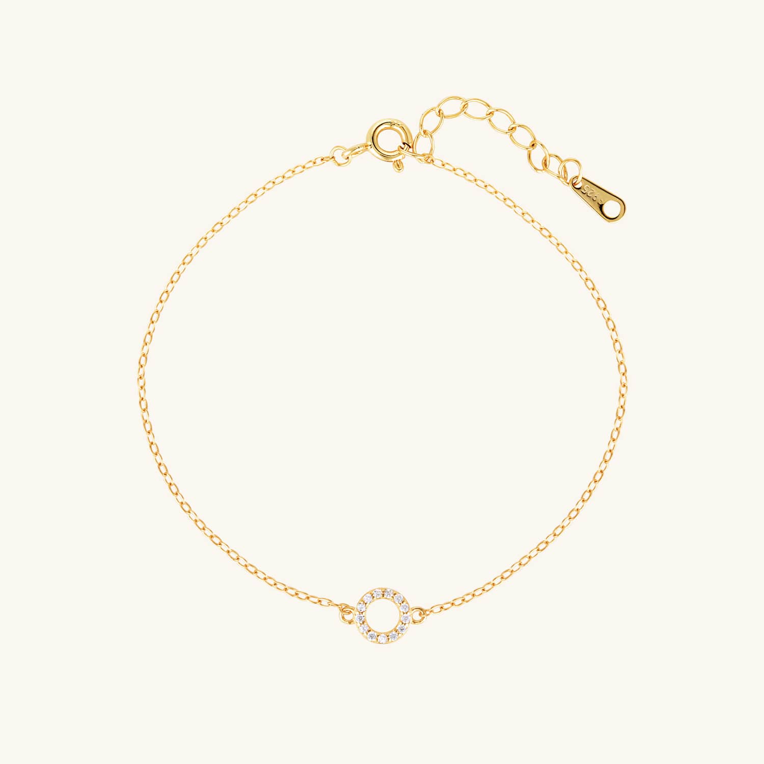 Gold bracelet with a delicate cubic zirconia circle, adding subtle sparkle and elegance. Perfect for layering or solo wear
