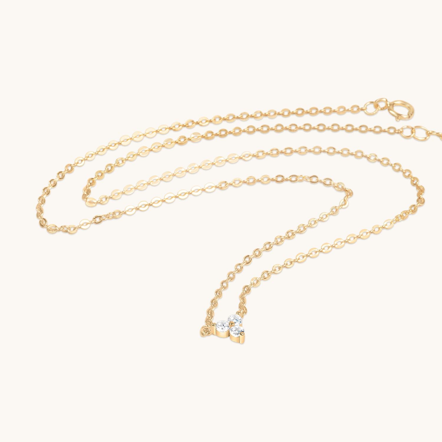 Gold lotus flower necklace with sparkling cubic zirconia, representing beauty and grace. A timeless piece for everyday elegance