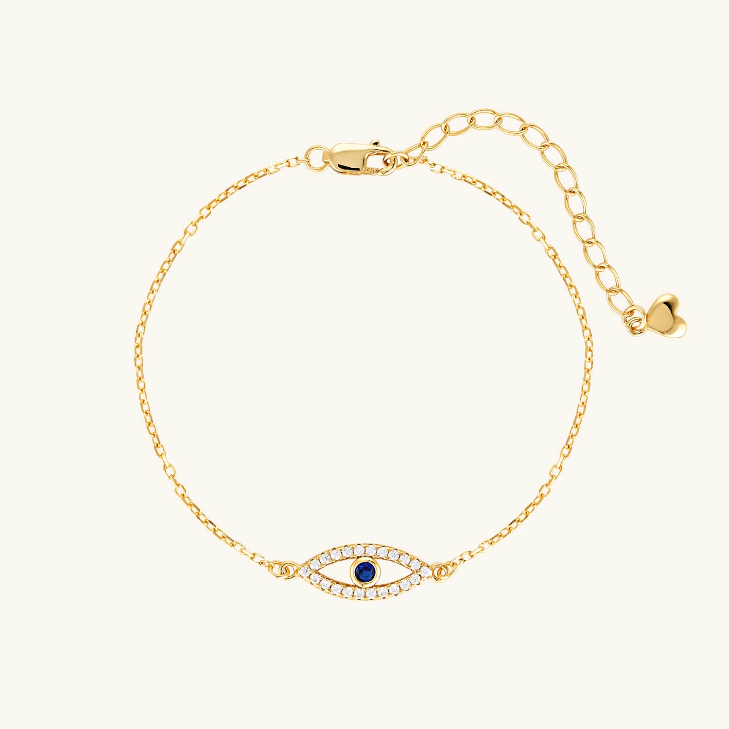 Gold evil eye bracelet with a sleek, minimalist design. A stylish piece with subtle symbolism, perfect for layering or daily wear