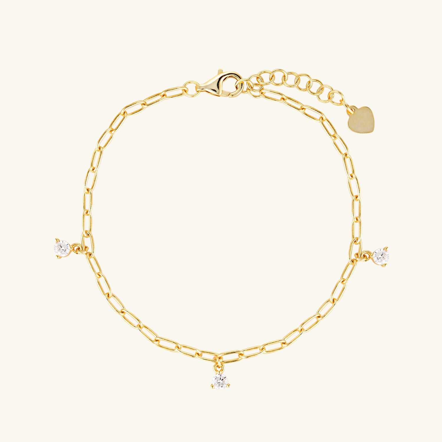 Golden Stardrop Bracelet featuring a delicate gold chain adorned with sparkling cubic zirconia drops, perfect for an elegant touch