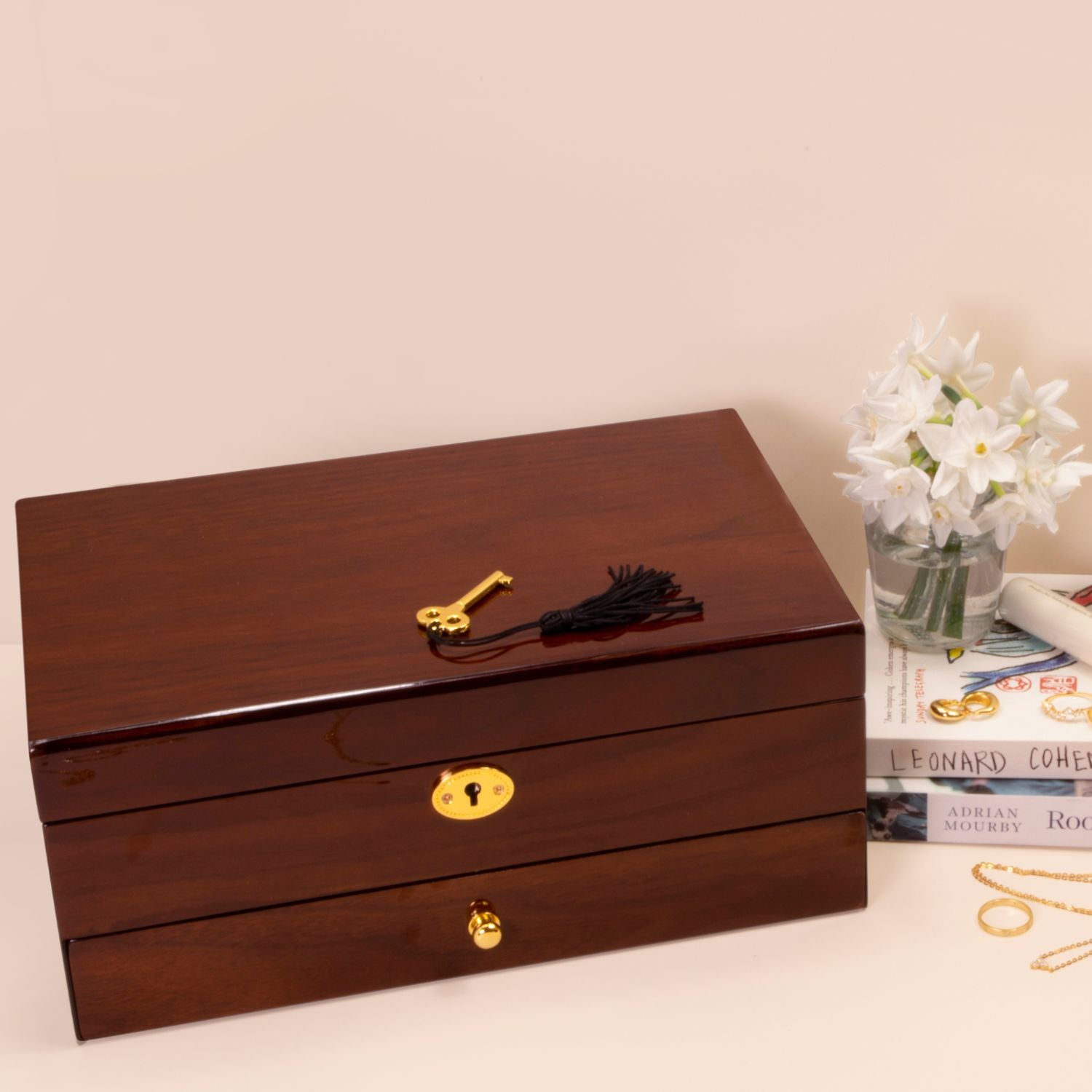Closed wooden jewellery box with one drawer on lifestyle background, featuring smooth wood finish