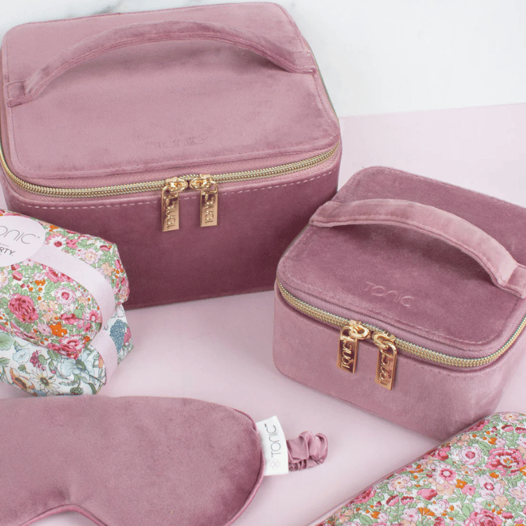 Open pink velvet jewellery box displaying jewellery inside, showcasing organized storage for rings, earrings, and accessories