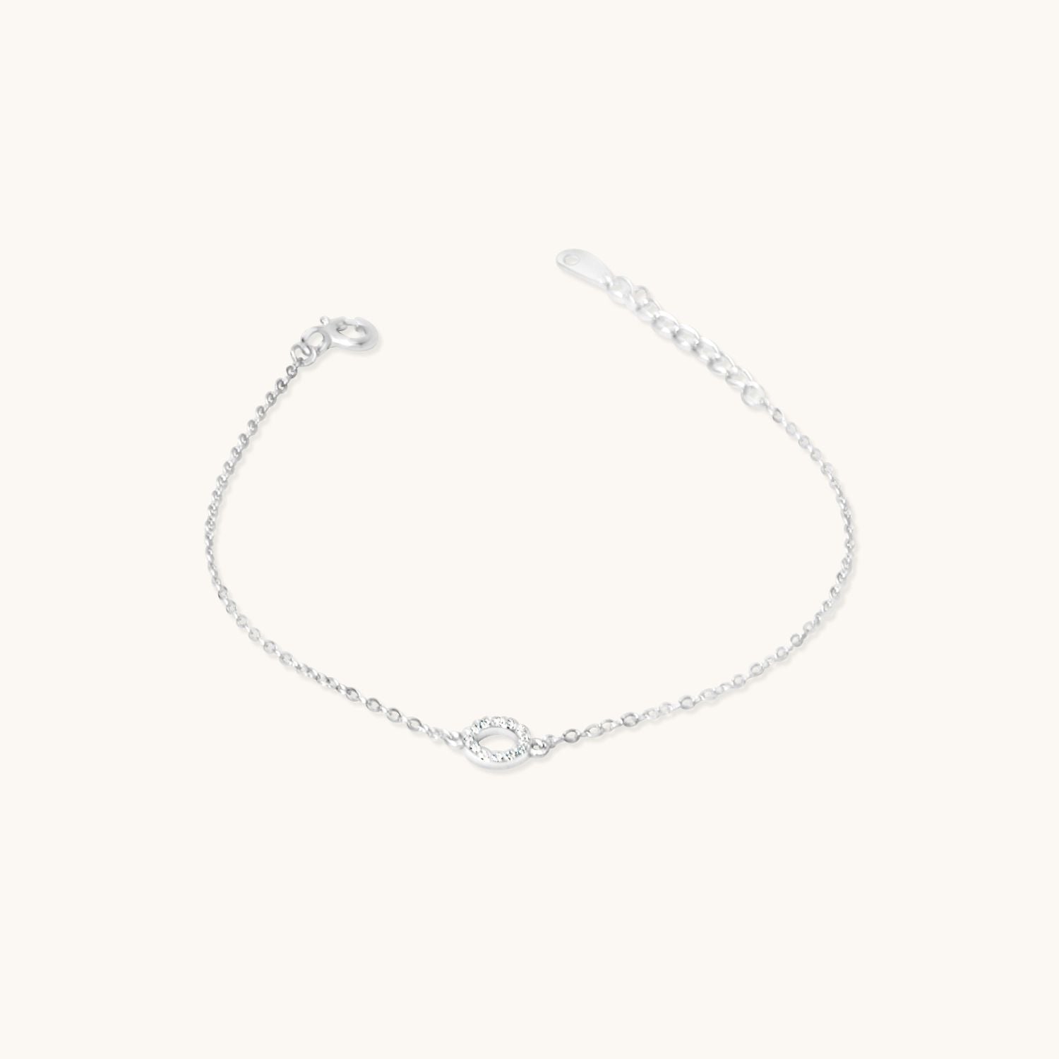 Elegant sterling silver bracelet featuring dainty cubic zirconia circle, offering timeless sparkle for everyday or special occasion wear