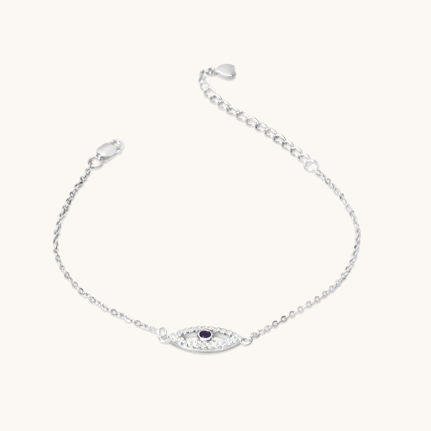 Sleek sterling silver evil eye bracelet, a modern and symbolic piece designed for effortless style. Perfect for everyday wear or stacking