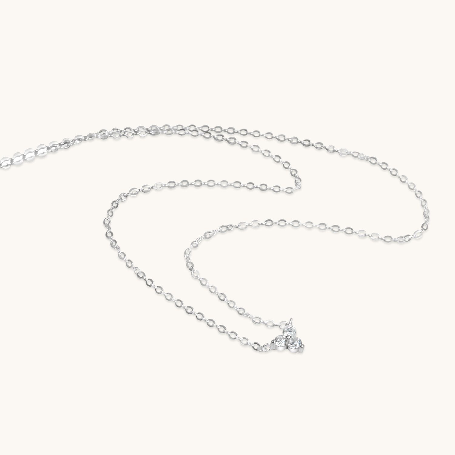 Elegant silver lotus flower necklace with dazzling cubic zirconia accents, symbolizing purity and grace. A timeless and versatile accessory