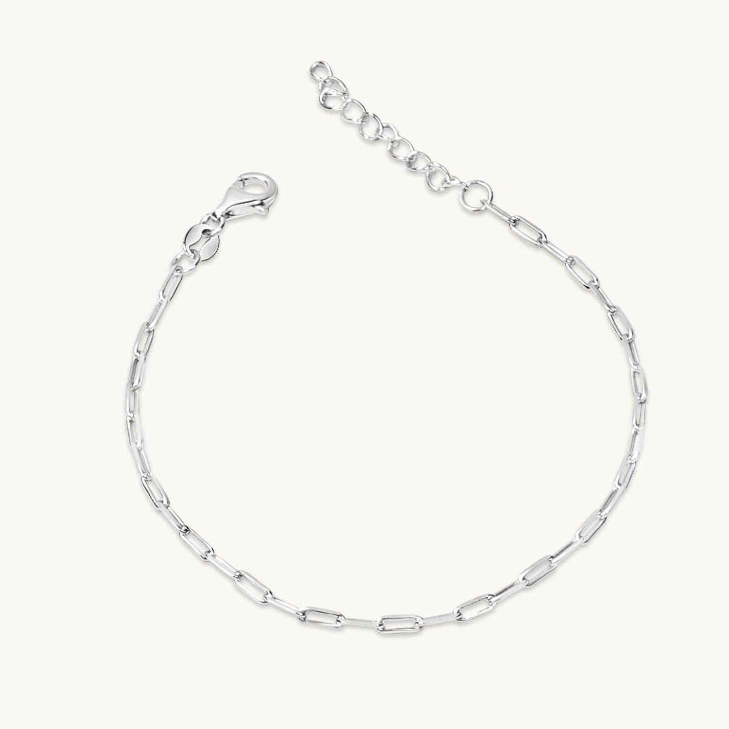 Sterling silver paperclip bracelet featuring a sleek, modern chain-link design. A versatile accessory for effortless layering or solo wear