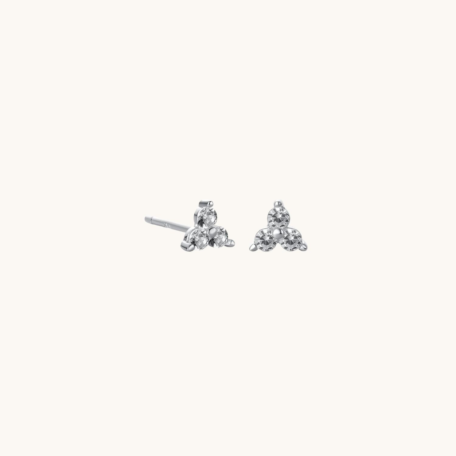 Silver lotus cubic zirconia earrings with a shimmering floral design, adding a touch of elegance and sophistication to any outfit