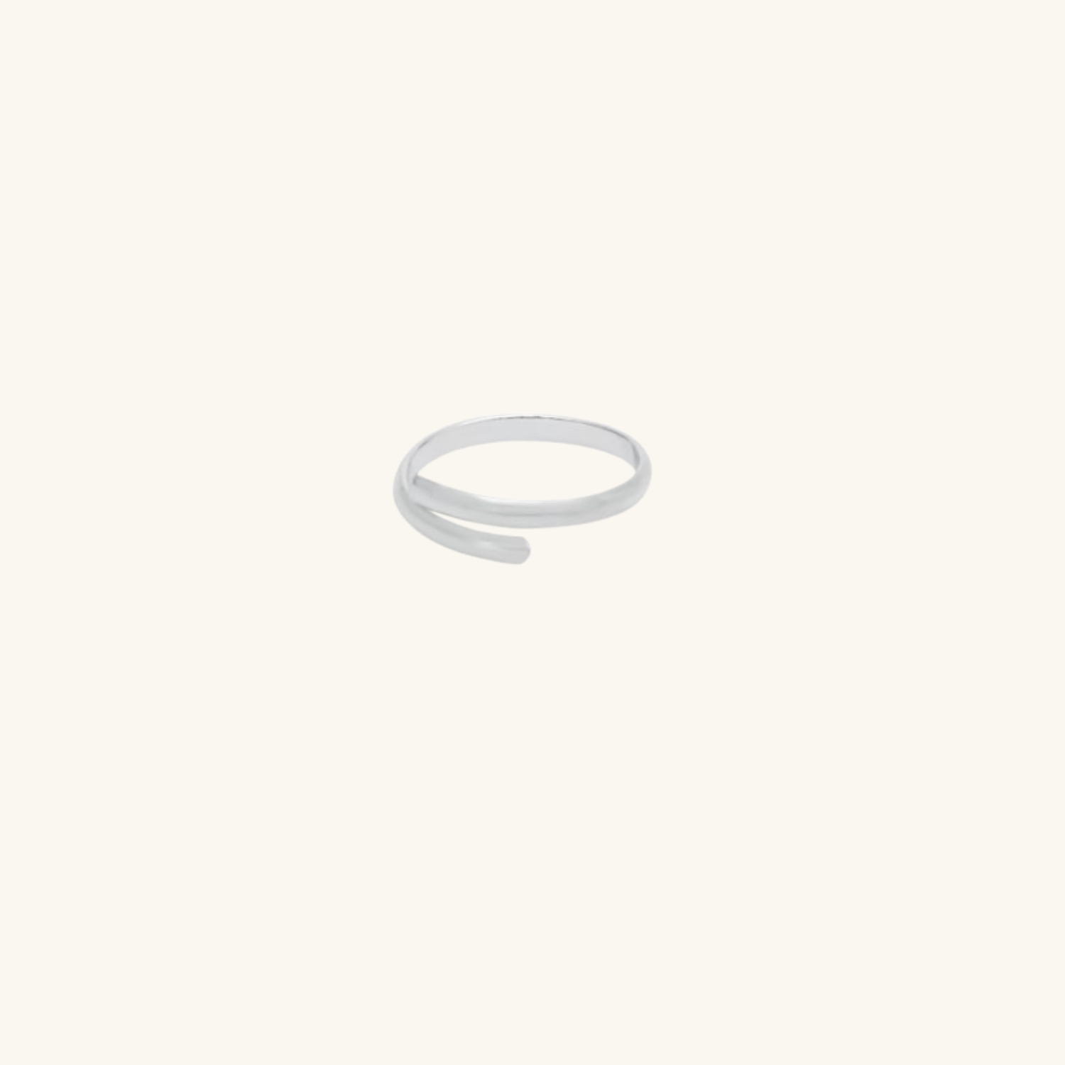 Silver toe ring on a white background
