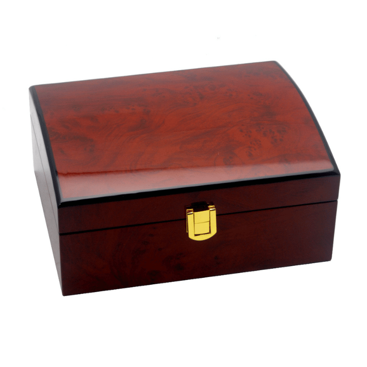 Closed wood finish jewellery box on white background, featuring a sleek design with a smooth timber exterior