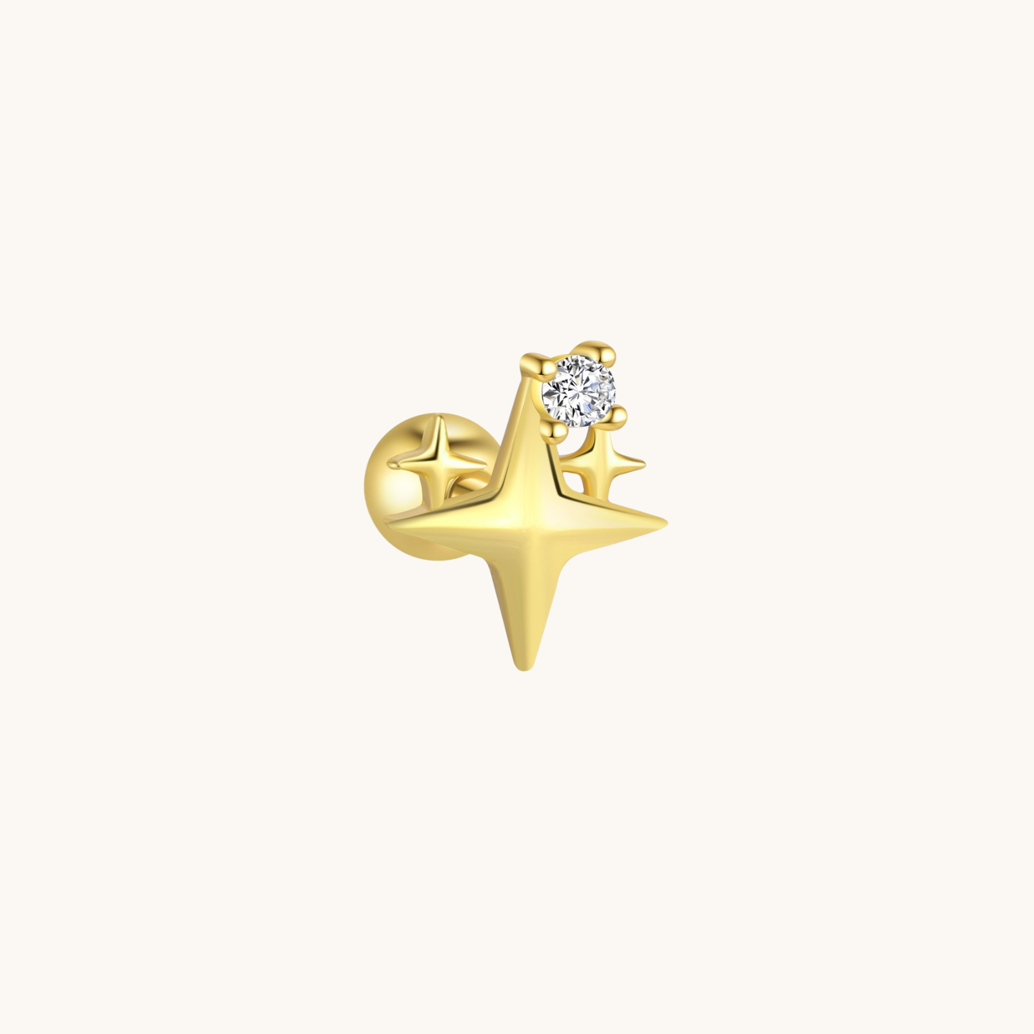 A gold star-shaped stud earring with a small clear round gemstone, shown from the back on a plain off-white background.