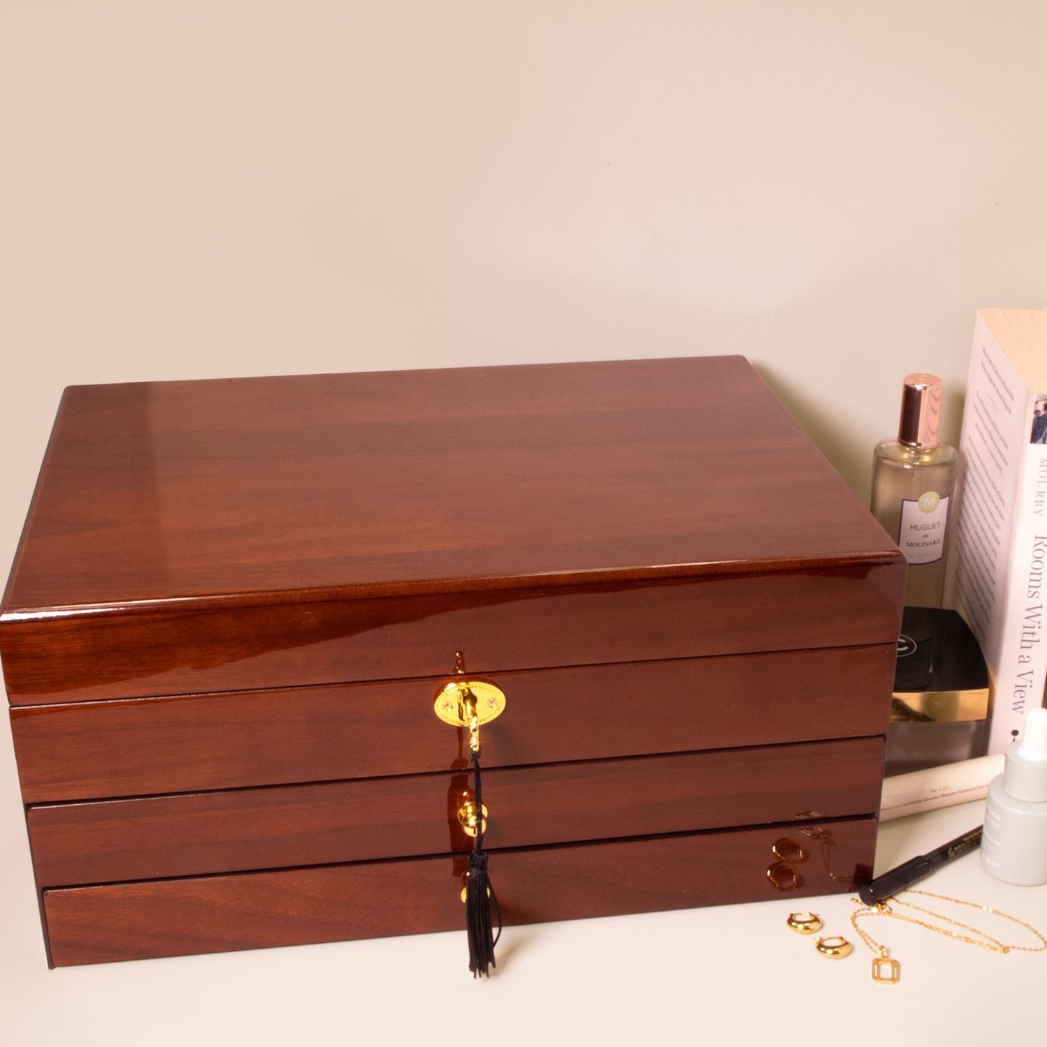 Closed wooden jewellery box with two drawers on lifestyle background, featuring smooth wood finish