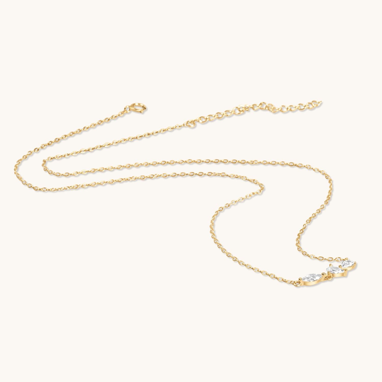 gold cz 3 petals necklace flat lay