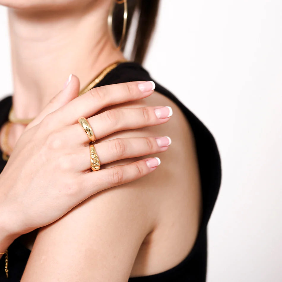 model wearing croissant dome ring