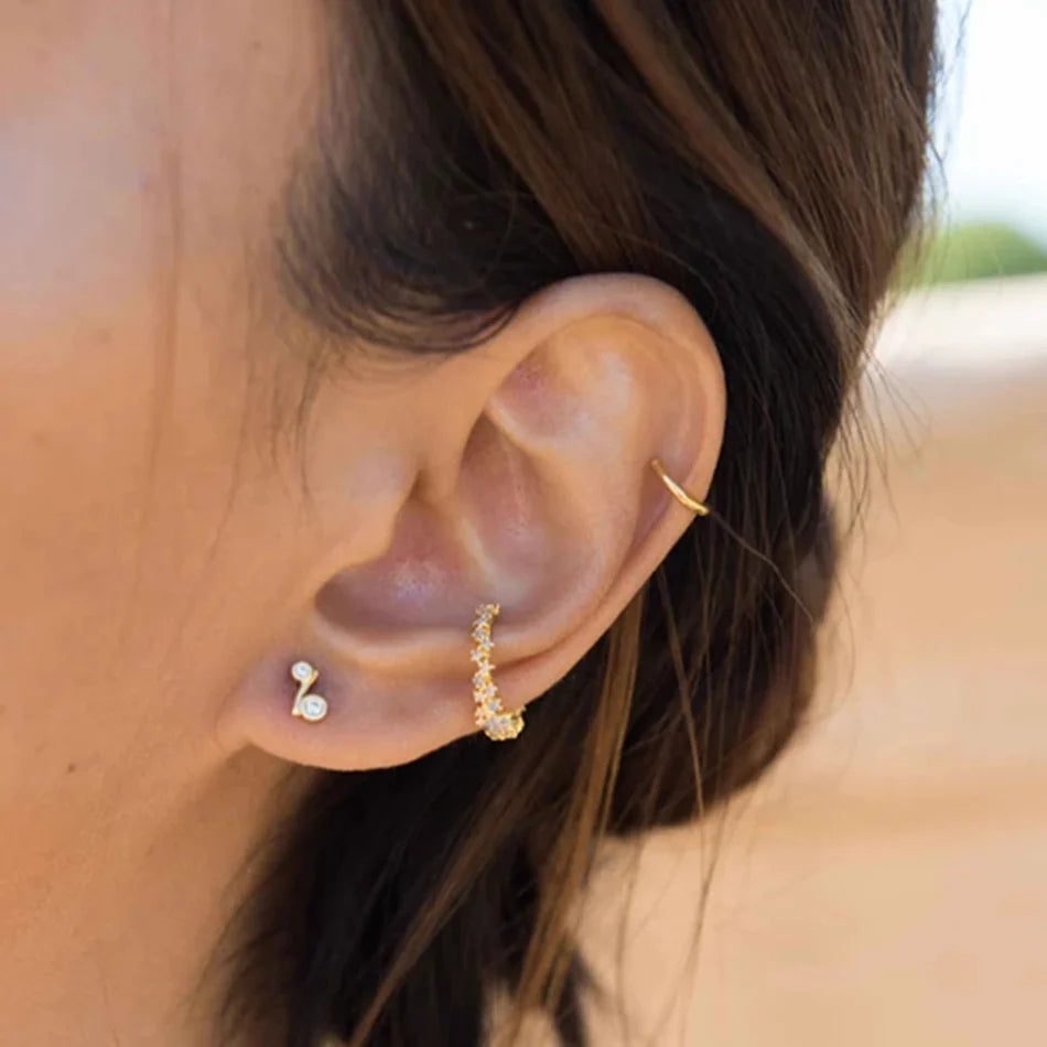 Model wearing cubic zirconia earring stacked