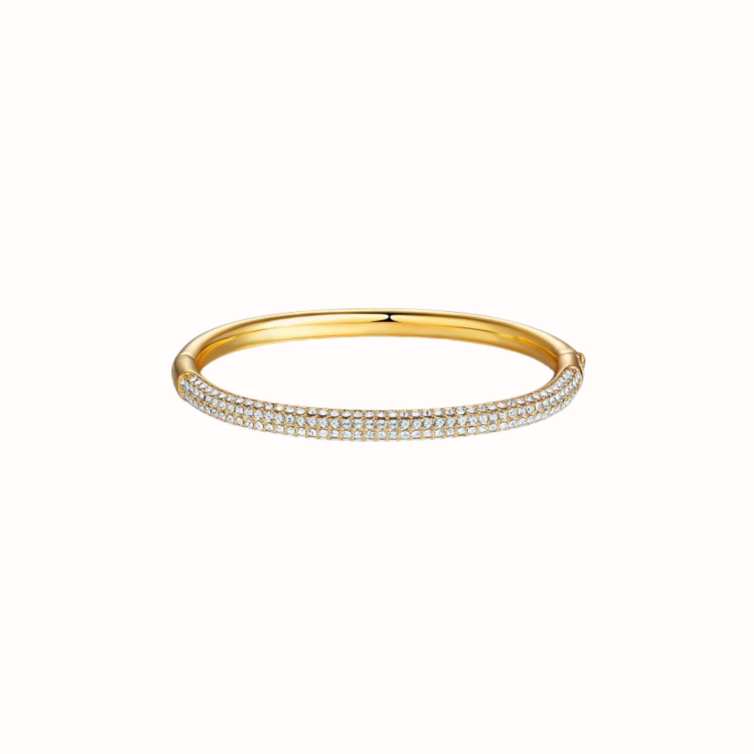 Gold bangle with Austrian crystals on a white background