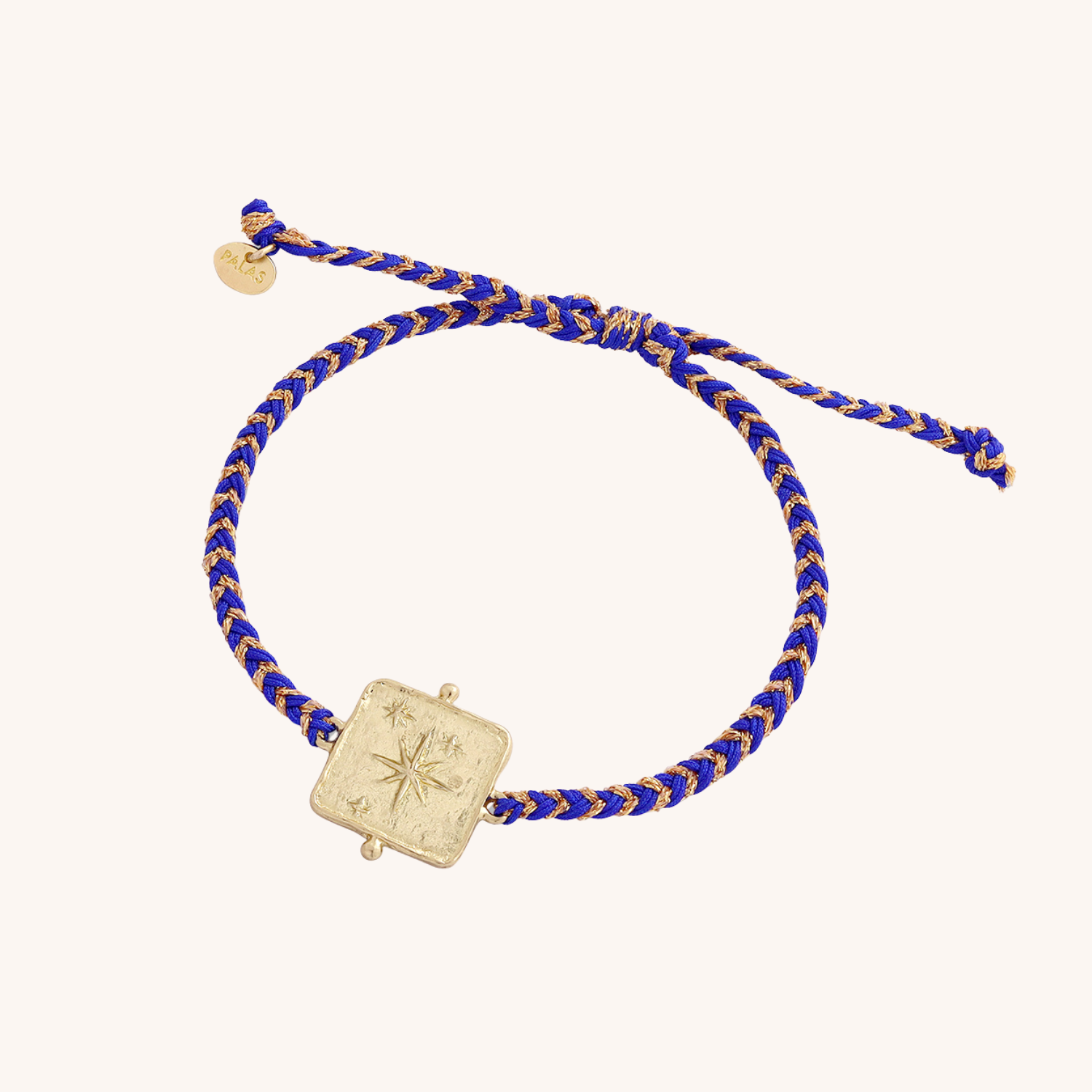 Dream believe receive bracelet on cream coloured background