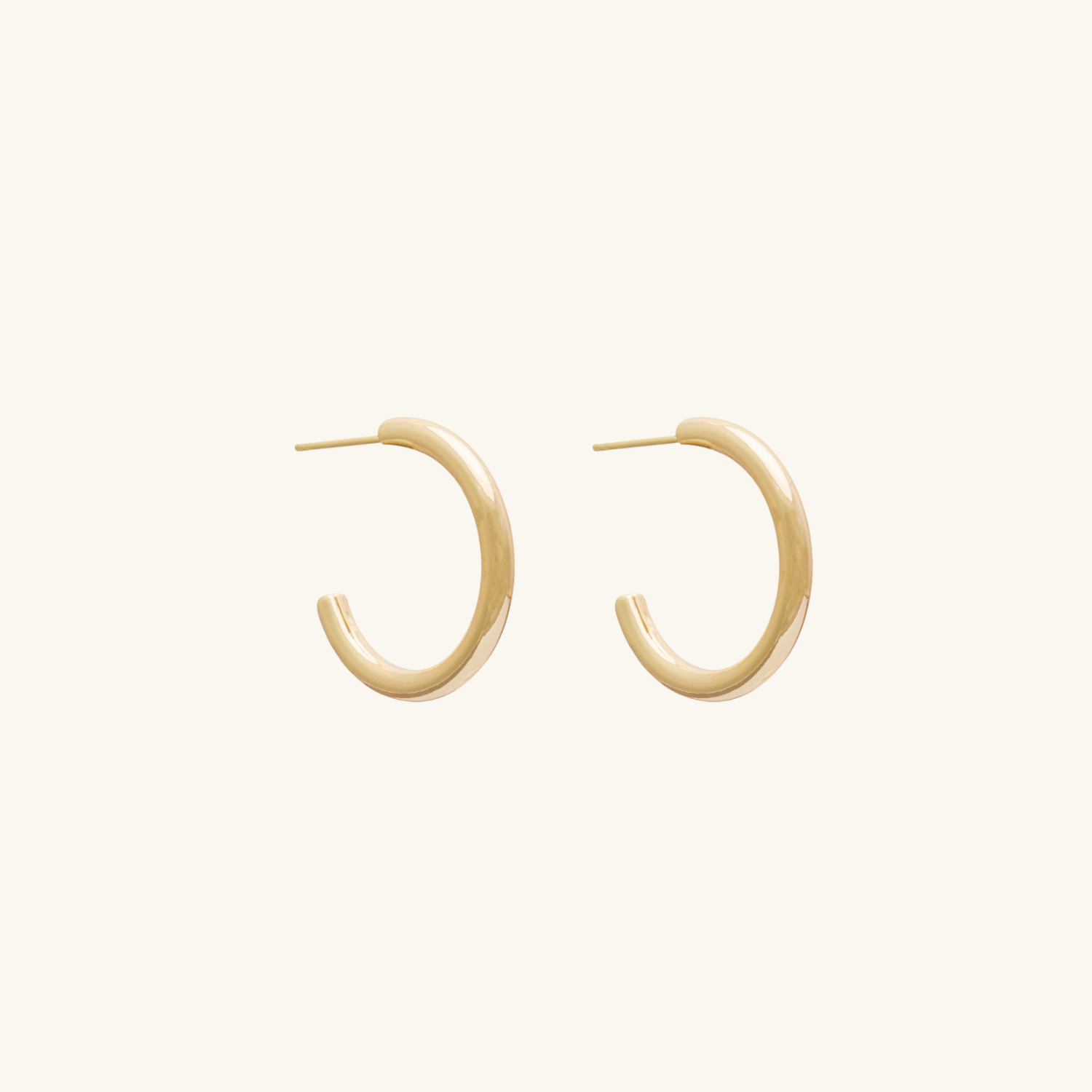 25MM Gold hoop earrings on a white background