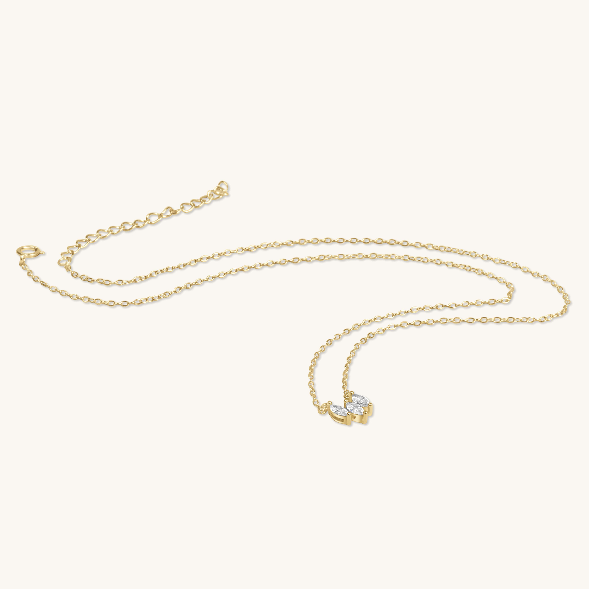 Gold CZ tear necklace flat