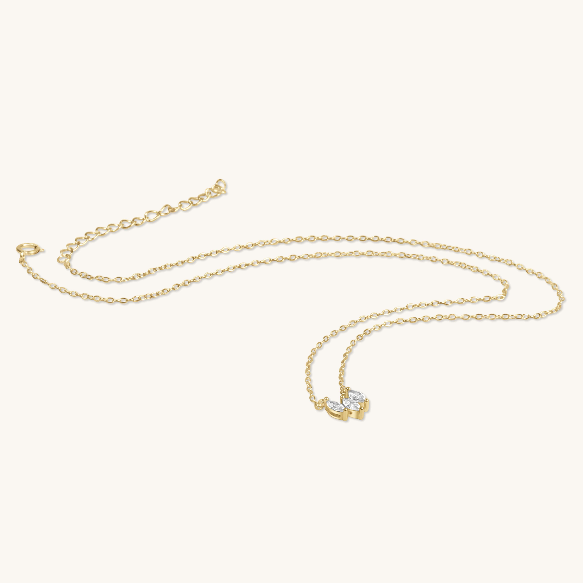 Shine effortlessly with the Three Tear cubic zirconia necklace. Featuring three sparkling teardrop stones on a delicate chain, it's elegant and timeless