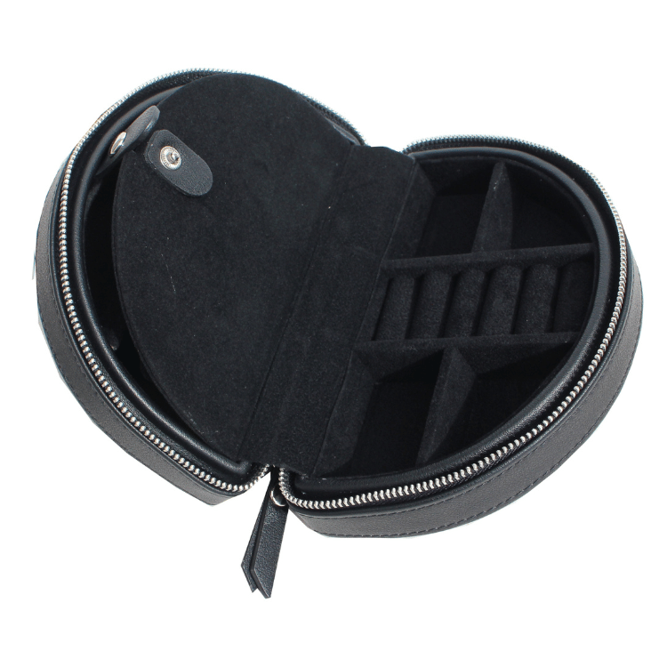 Black half-circle travel jewellery holder unzipped, revealing organized compartments for rings, earrings, and accessories