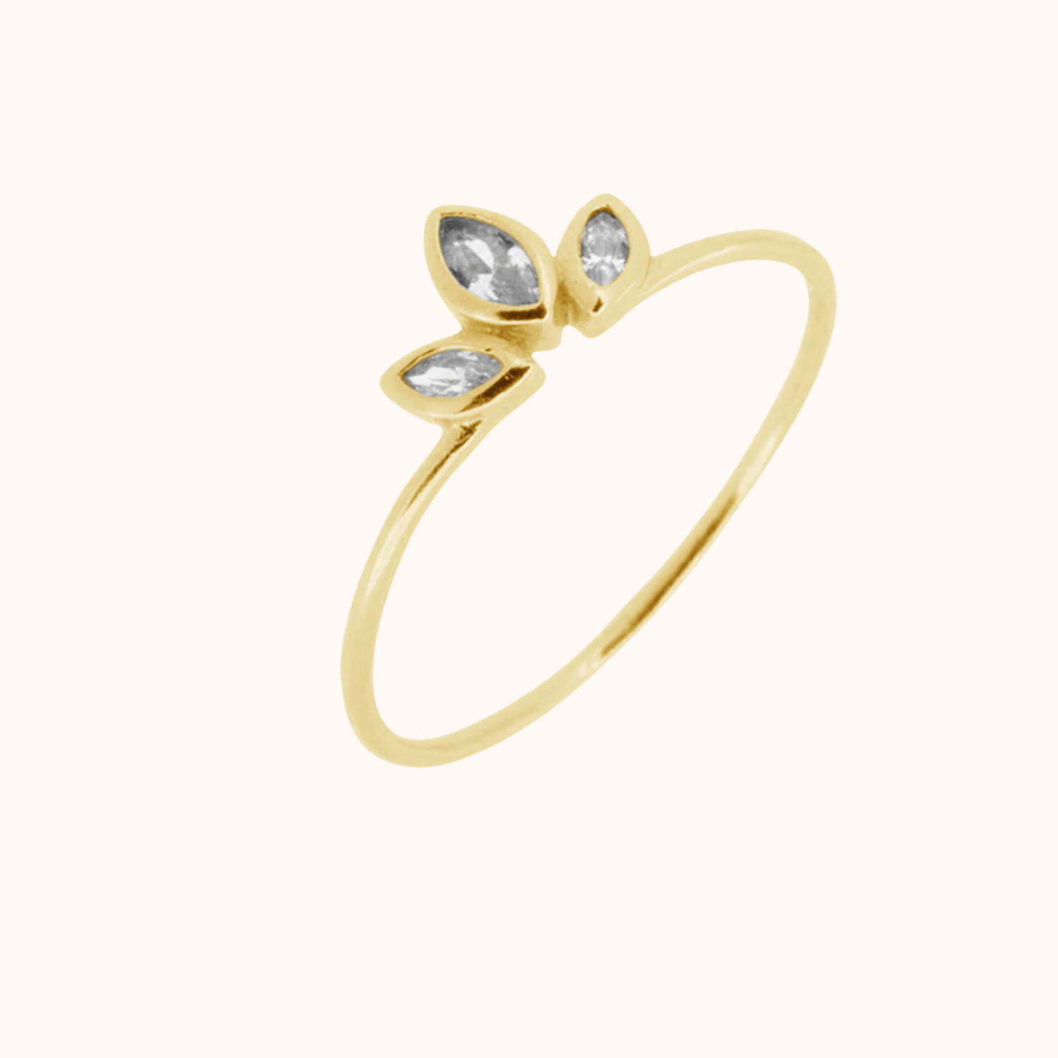 Gold Tiara ring on cream background