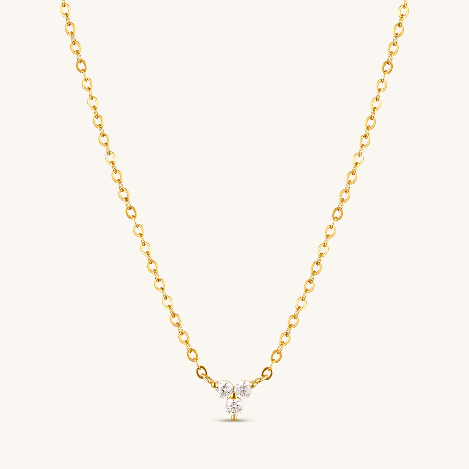 Cubic zirconia lotus flower necklace featuring a delicate floral design with sparkling stones on a fine gold chain. Elegant, timeless, and symbolic of purity