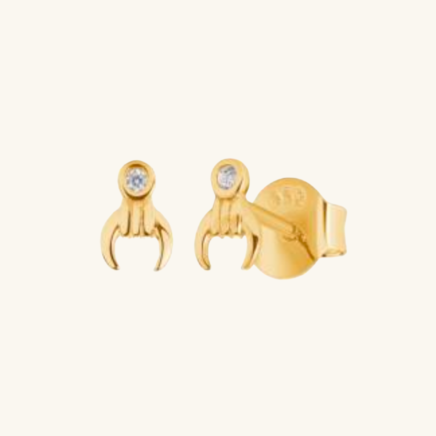 Luna Arc Studs shown on cream background