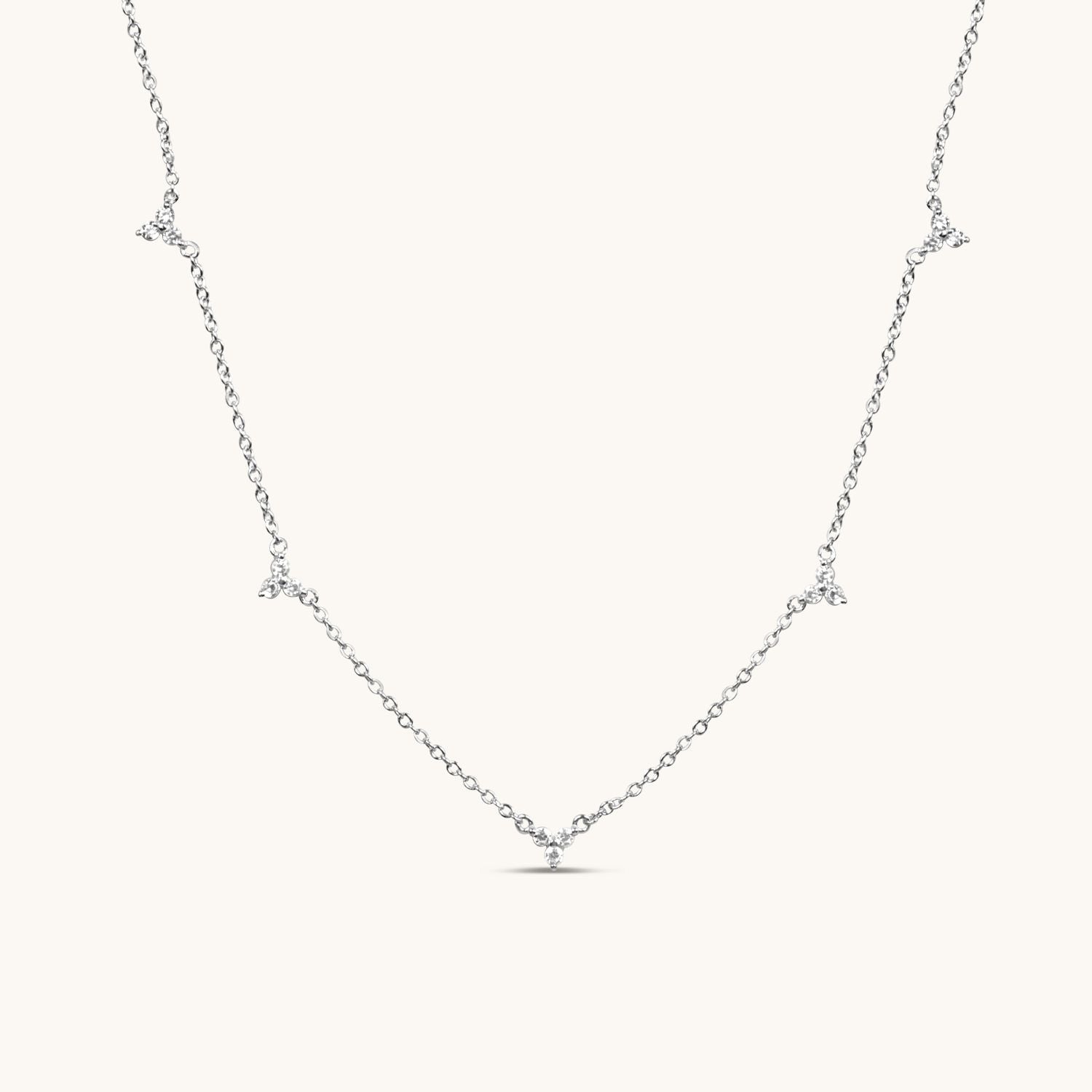 multi lotus silver flower necklace, cubic zirconia flowers along length of necklace