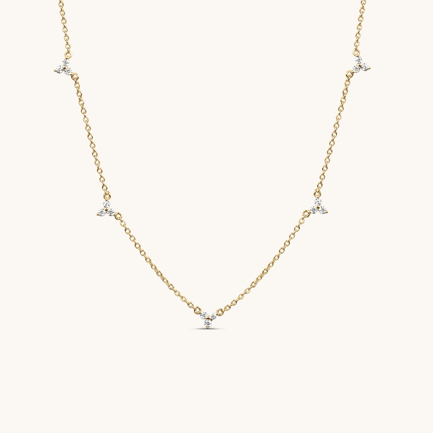 multi lotus gold flower necklace, cubic zirconia flowers along length of necklace