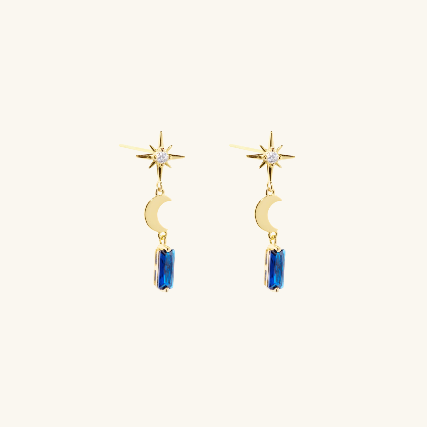 Nocturne Drop Earrings on cream background