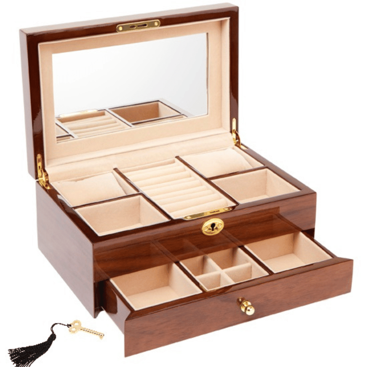 Wooden jewellery box with one drawer open on white background, showing velour interior and compartments