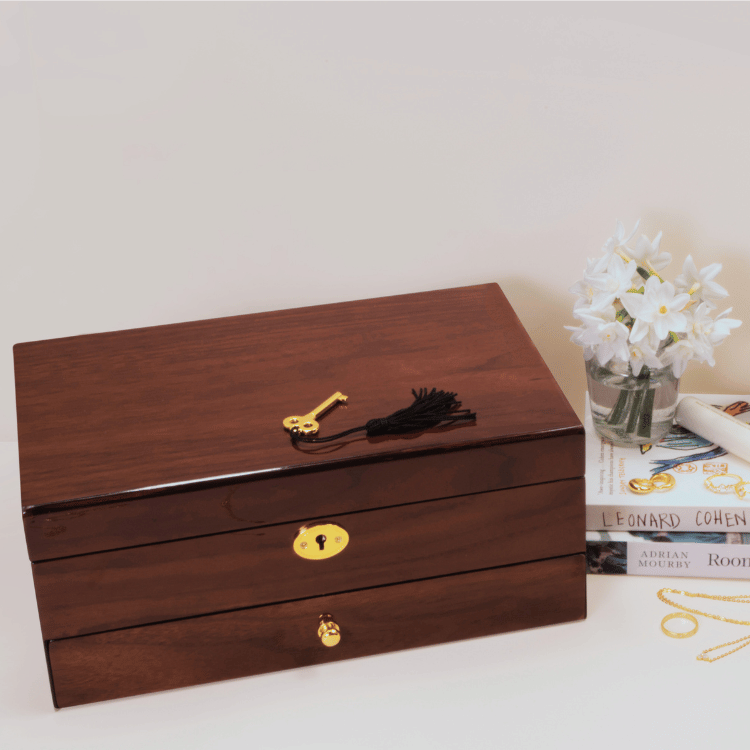 Closed wooden jewellery box with one drawer on lifestyle background, featuring smooth wood finish