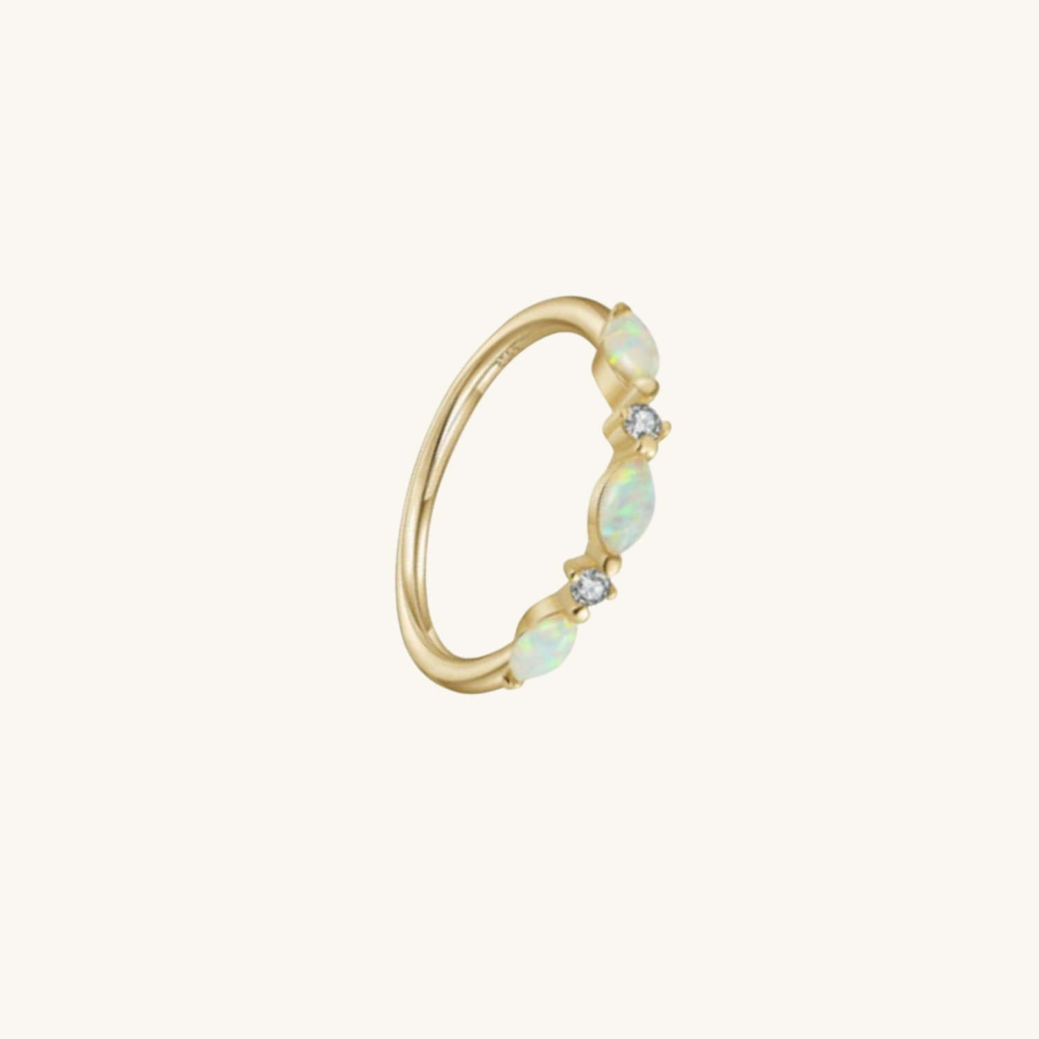 Opal ring with Cubic zirconia on a white background