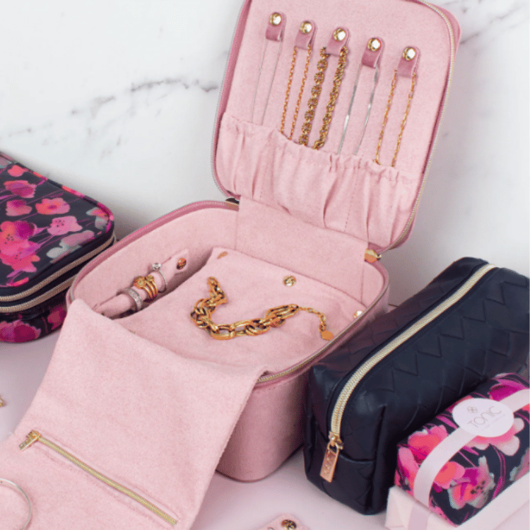 Open pink velvet jewellery box displaying jewellery inside, showcasing organized storage for rings, earrings, and accessories