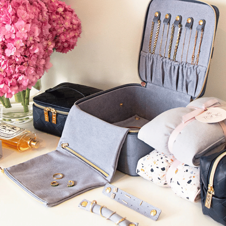 Open blue velvet jewellery box displaying jewellery inside, showcasing organized storage for rings, earrings, and accessories