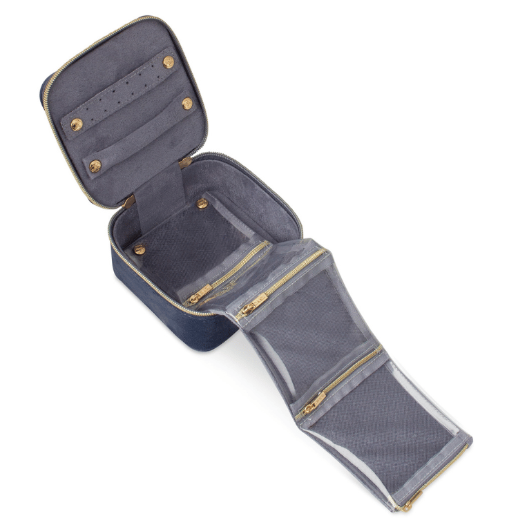 Blue velvet jewellery case showcasing organised storage compartments