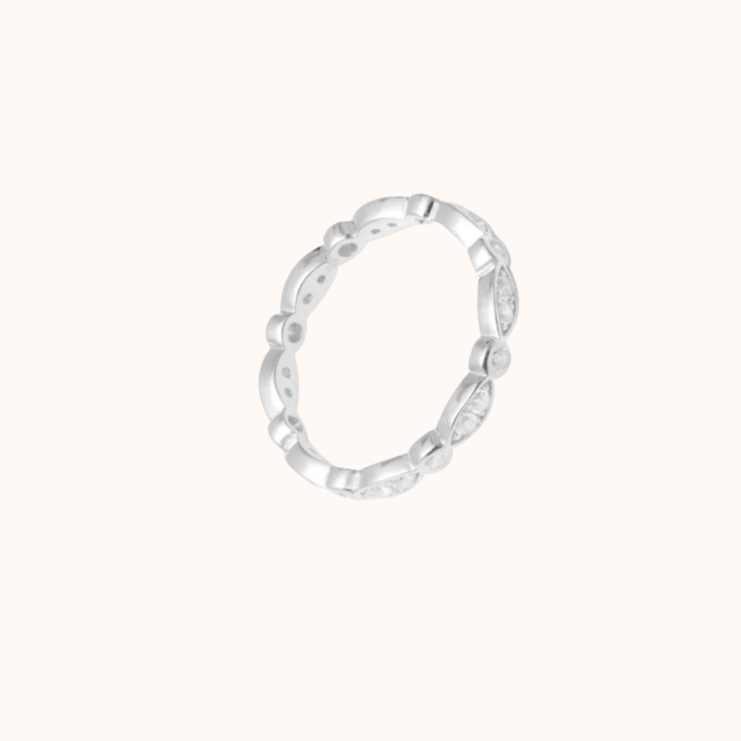 Silver Cubic zirconia ring shown on cream background