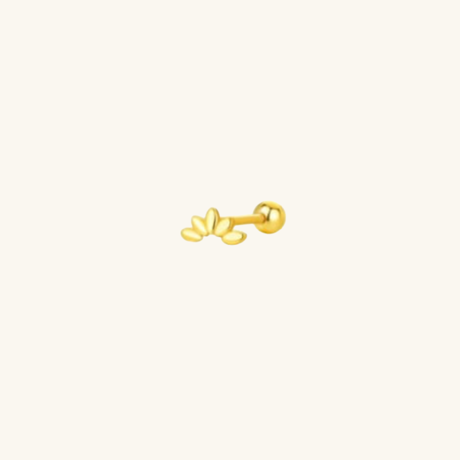 Gold petal single earring on a white background