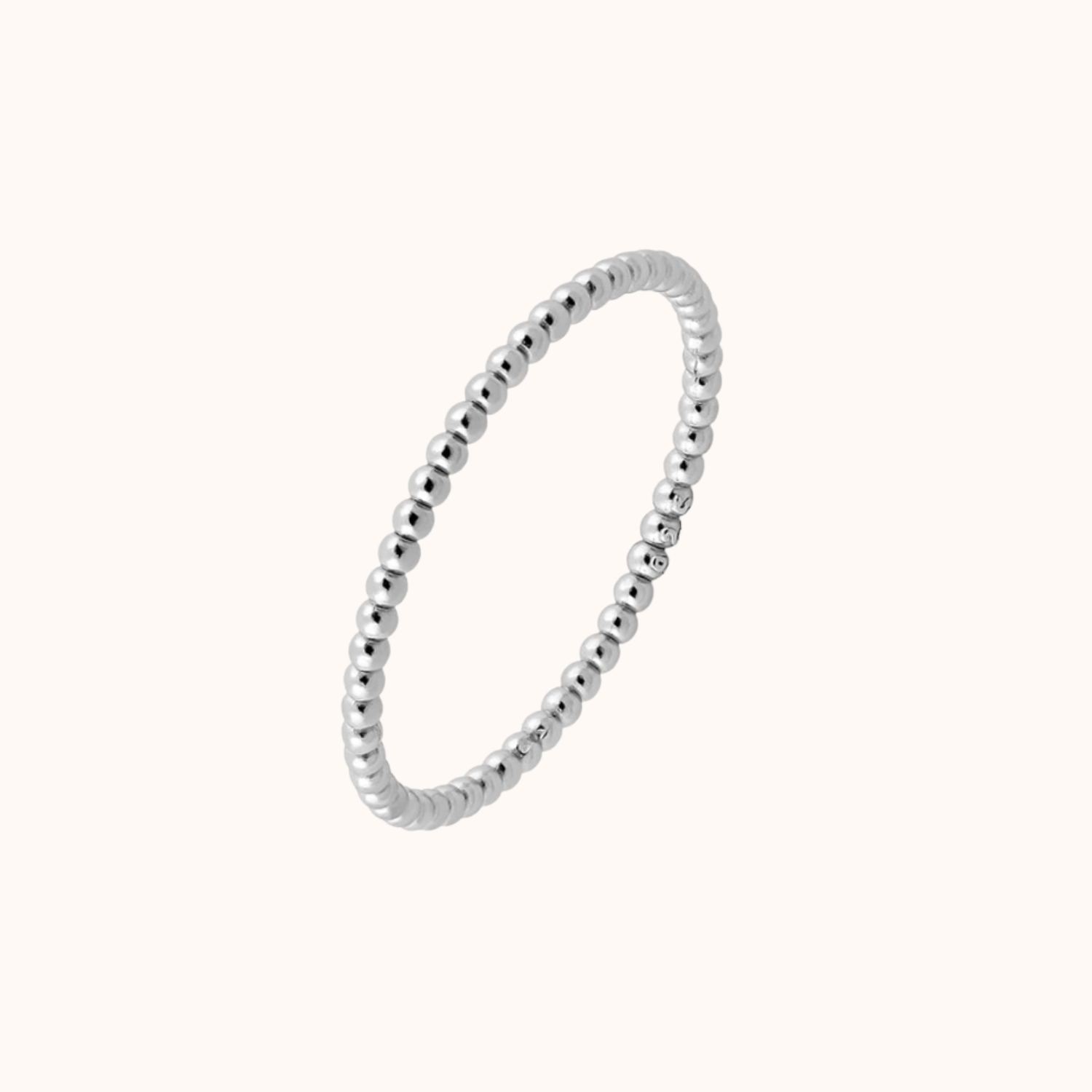 Silver_Bead_Ring on cream background