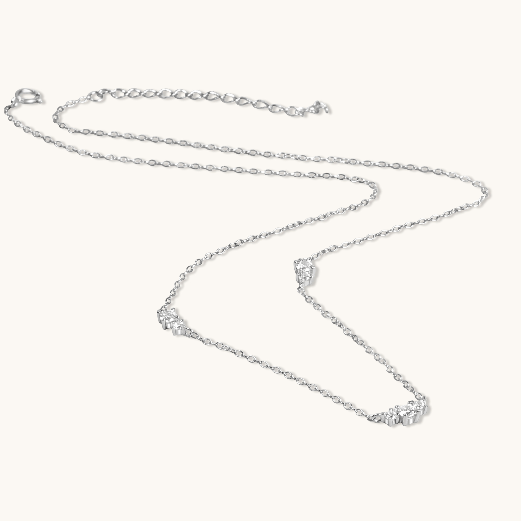 Silver floating cubic zirconia necklace flat