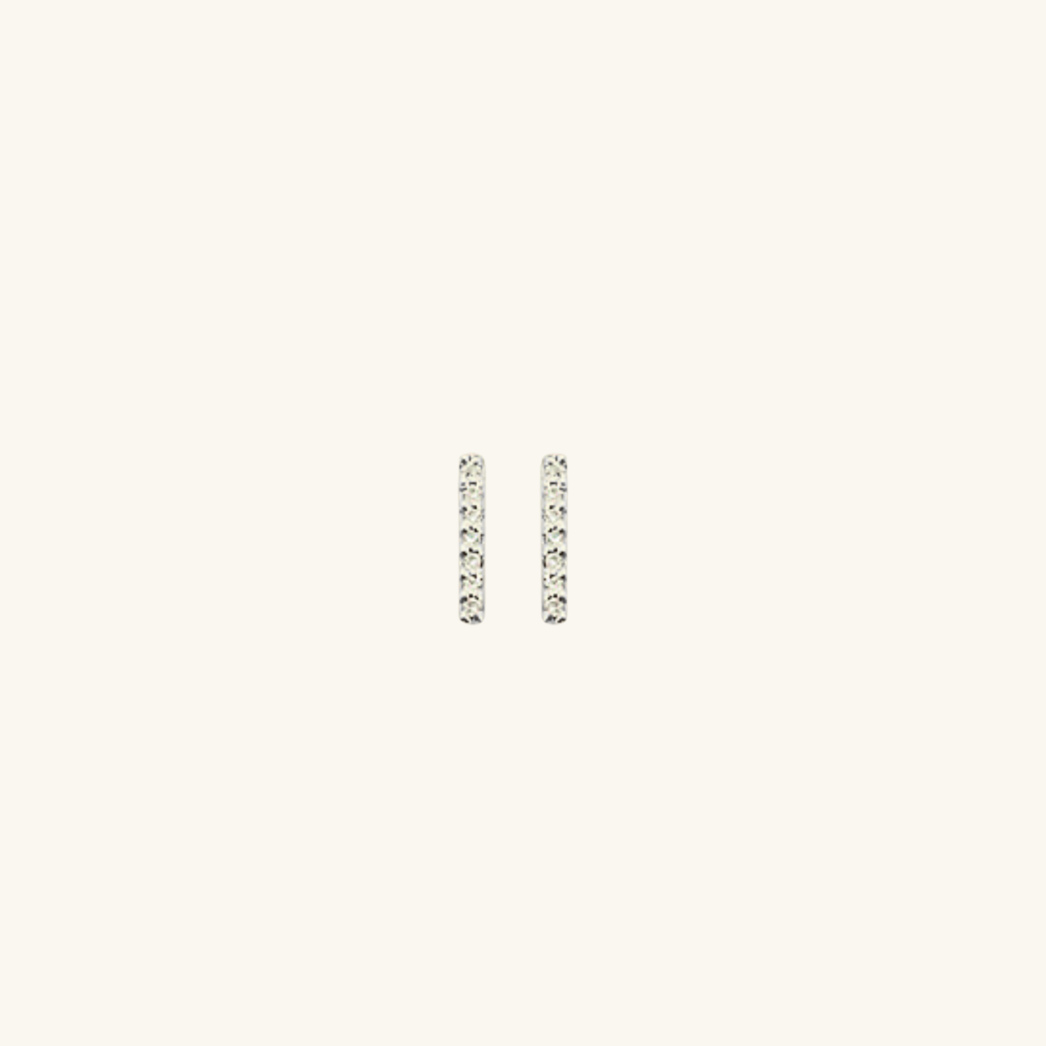 Soft_Shine_Bar_Studs on cream background